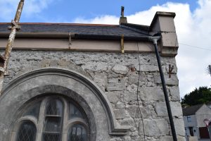 The southern facing window in the Choir Gallery with the top arch of a previous narrower window clearly visible